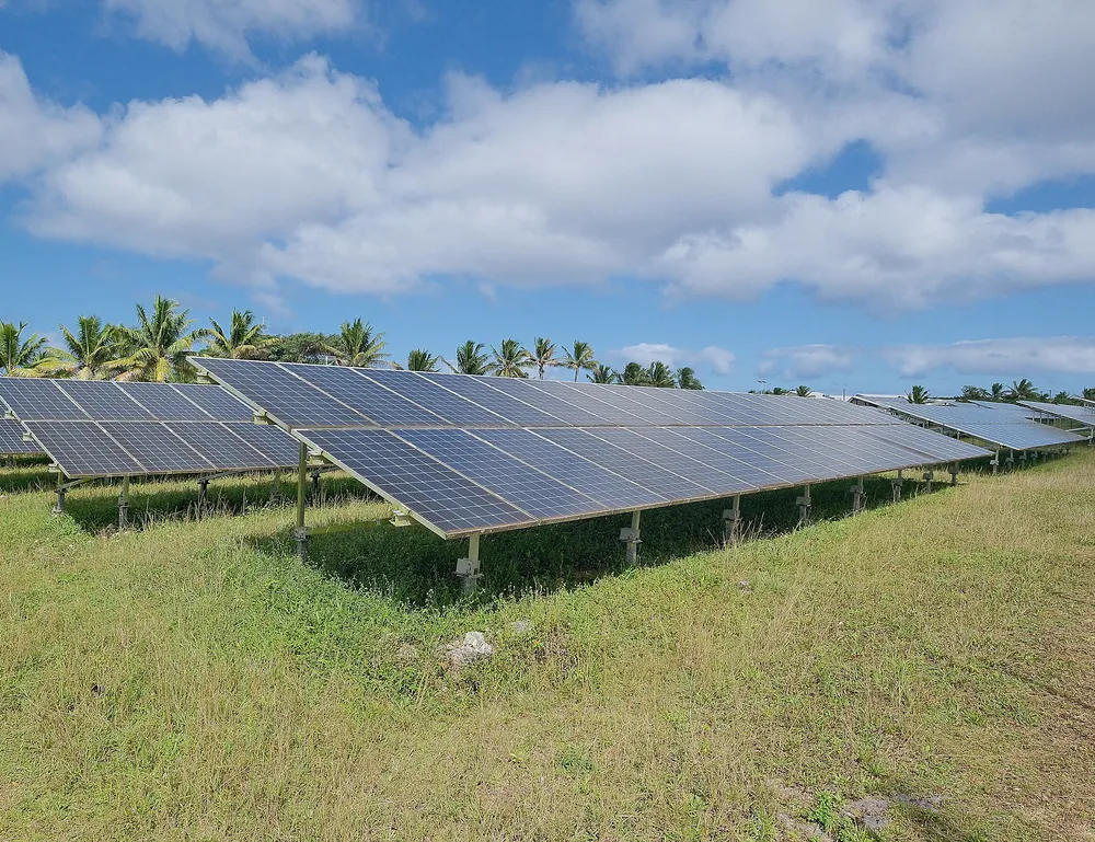 Rows of solar panels in a field